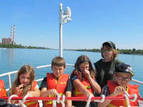 Students on a shipboard excursion in the Detroit area.