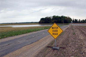 "Water over road" sign