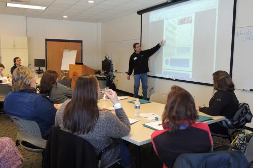 Educators sharing learning opportunities at NE MI GLSI conferance image.